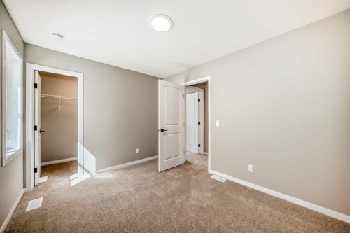 103 Mercado Crescent Se, Calgary, AB - Indoor Photo Showing Other Room