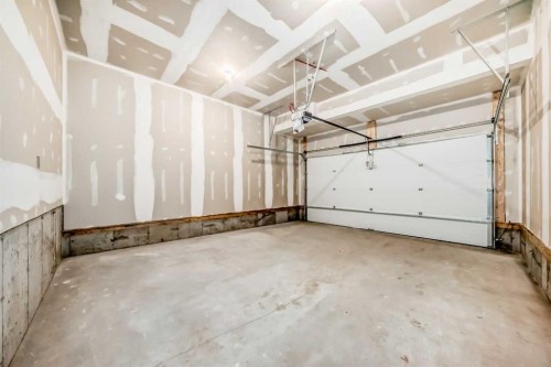 103 Mercado Crescent Se, Calgary, AB - Indoor Photo Showing Garage