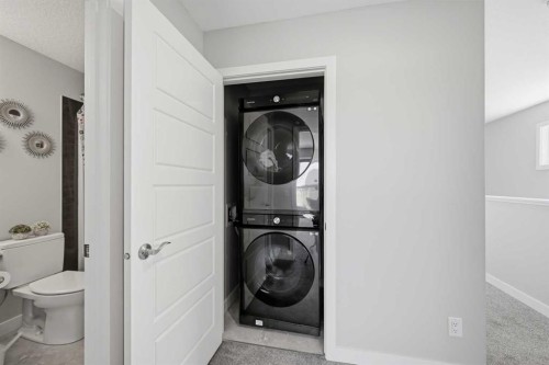 4065 Cornerstone Boulevard Ne, Calgary, AB - Indoor Photo Showing Laundry Room
