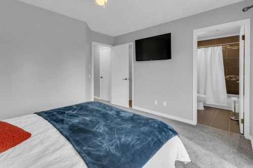 42 River Rock Green Se, Calgary, AB - Indoor Photo Showing Bedroom