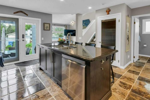 42 River Rock Green Se, Calgary, AB - Indoor Photo Showing Kitchen