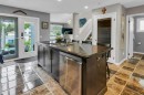 42 River Rock Green Se, Calgary, AB  - Indoor Photo Showing Kitchen 