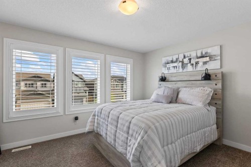 68 Legacy Manor Se, Calgary, AB - Indoor Photo Showing Bedroom
