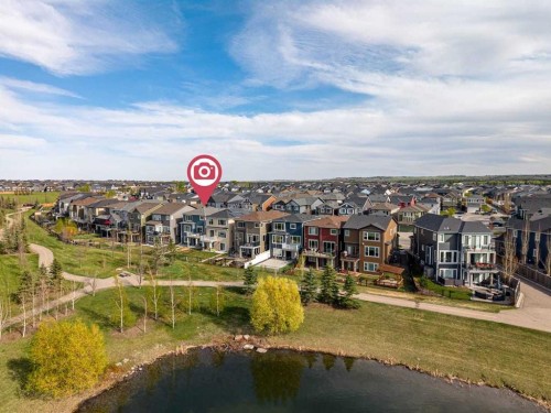 68 Legacy Manor Se, Calgary, AB - Outdoor With Body Of Water With View