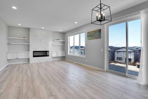 179 Lucas Heights Nw, Calgary, AB - Indoor Photo Showing Living Room With Fireplace