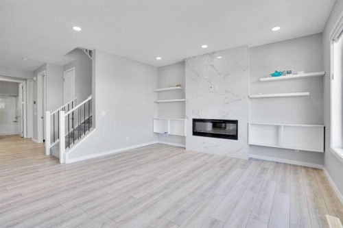 179 Lucas Heights Nw, Calgary, AB - Indoor With Fireplace