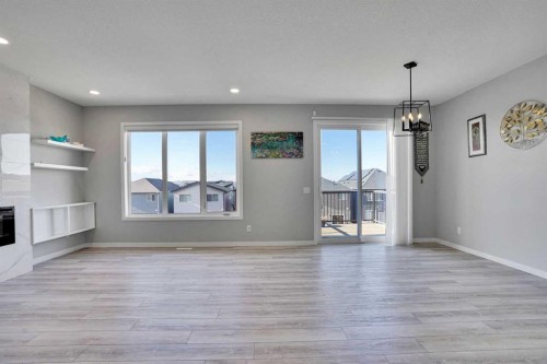179 Lucas Heights Nw, Calgary, AB - Indoor With Fireplace