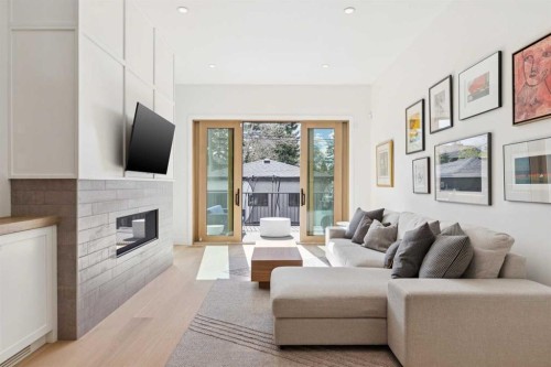 534 35A Street Nw, Calgary, AB - Indoor Photo Showing Living Room With Fireplace