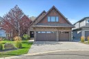 85 Rockcliff Heights Nw, Calgary, AB  - Outdoor With Facade 