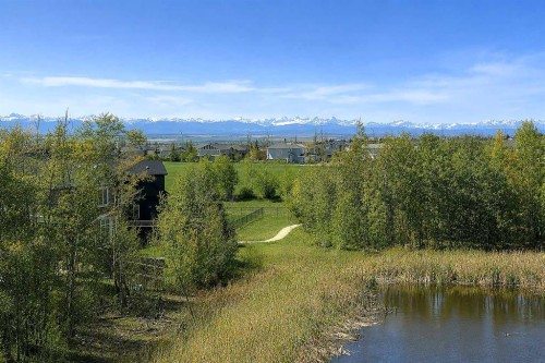 85 Rockcliff Heights Nw, Calgary, AB - Outdoor With Body Of Water With View