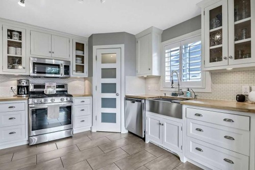 56 Mt Aberdeen Close Se, Calgary, AB - Indoor Photo Showing Kitchen With Upgraded Kitchen