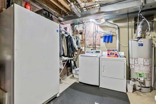 56 Mt Aberdeen Close Se, Calgary, AB - Indoor Photo Showing Laundry Room