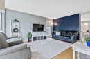 56 Mt Aberdeen Close Se, Calgary, AB  - Indoor Photo Showing Living Room 