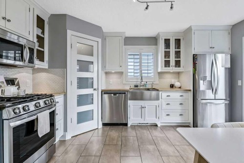 56 Mt Aberdeen Close Se, Calgary, AB - Indoor Photo Showing Kitchen With Upgraded Kitchen