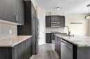 249 Sage Hill Grove Nw, Calgary, AB  - Indoor Photo Showing Kitchen With Double Sink With Upgraded Kitchen 