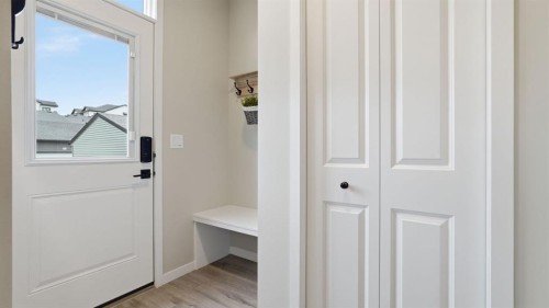 77 Wolf Gate, Okotoks, AB - Indoor Photo Showing Other Room