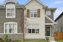 77 Wolf Gate, Okotoks, AB  - Outdoor With Facade 