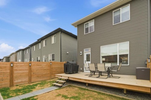 77 Wolf Gate, Okotoks, AB - Outdoor With Deck Patio Veranda With Exterior