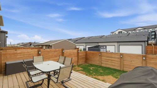 77 Wolf Gate, Okotoks, AB - Outdoor With Deck Patio Veranda