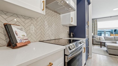 77 Wolf Gate, Okotoks, AB - Indoor Photo Showing Kitchen