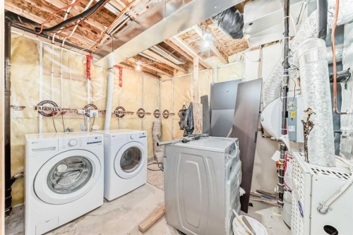 262 Coventry Court Ne, Calgary, AB - Indoor Photo Showing Laundry Room