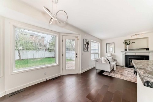 262 Coventry Court Ne, Calgary, AB - Indoor Photo Showing Living Room With Fireplace
