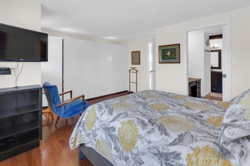 111 Point Drive Nw, Calgary, AB - Indoor Photo Showing Bedroom