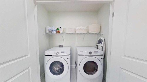 55 Belgian Crescent, Cochrane, AB - Indoor Photo Showing Laundry Room