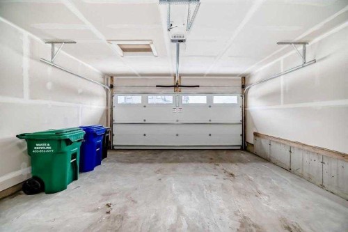 55 Belgian Crescent, Cochrane, AB - Indoor Photo Showing Garage
