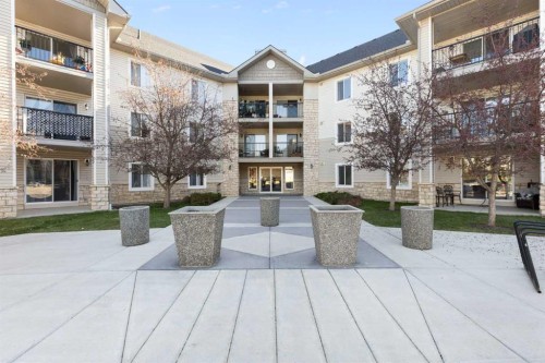2320-2371 Eversyde Avenue Sw, Calgary, AB - Outdoor With Balcony With Facade