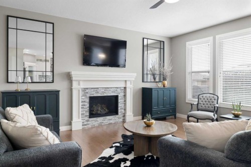 41 Banded Peak View, Okotoks, AB - Indoor Photo Showing Living Room With Fireplace
