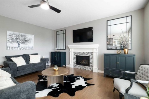 41 Banded Peak View, Okotoks, AB - Indoor Photo Showing Living Room With Fireplace