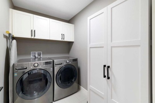 41 Banded Peak View, Okotoks, AB - Indoor Photo Showing Laundry Room