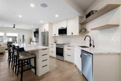 41 Banded Peak View, Okotoks, AB - Indoor Photo Showing Kitchen With Upgraded Kitchen