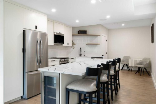 41 Banded Peak View, Okotoks, AB - Indoor Photo Showing Kitchen With Upgraded Kitchen