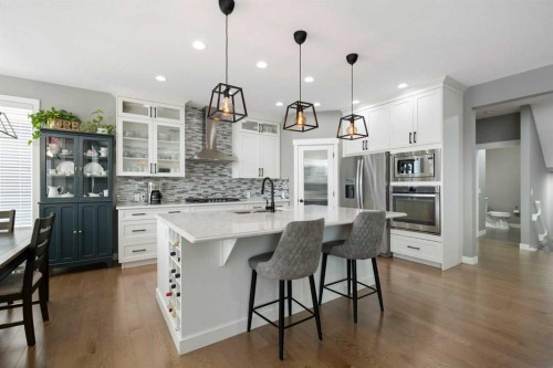 41 Banded Peak View, Okotoks, AB - Indoor Photo Showing Kitchen With Upgraded Kitchen