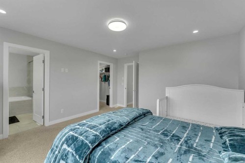 152 Savanna Way Ne, Calgary, AB - Indoor Photo Showing Bedroom