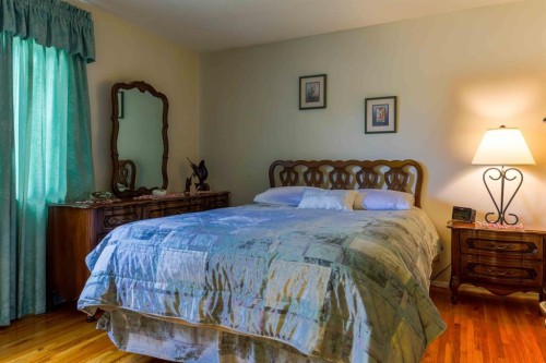 1444 Acadia Drive Se, Calgary, AB - Indoor Photo Showing Bedroom