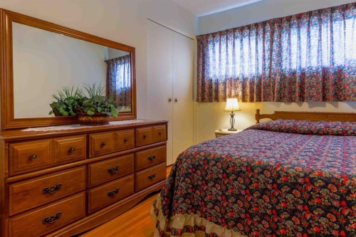 1444 Acadia Drive Se, Calgary, AB - Indoor Photo Showing Bedroom