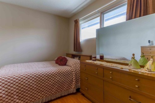 1444 Acadia Drive Se, Calgary, AB - Indoor Photo Showing Bedroom