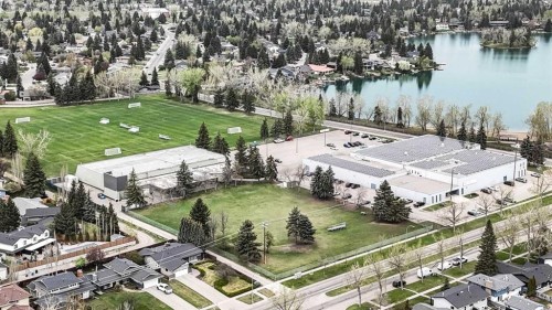1444 Acadia Drive Se, Calgary, AB - Outdoor With Body Of Water