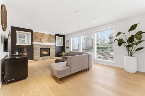 335 Chapala Point Se, Calgary, AB - Indoor Photo Showing Living Room With Fireplace
