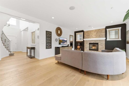 335 Chapala Point Se, Calgary, AB - Indoor Photo Showing Living Room With Fireplace