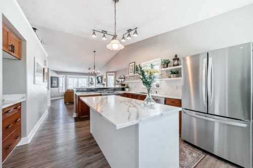 39 Westfall Crescent, Okotoks, AB - Indoor Photo Showing Kitchen With Upgraded Kitchen