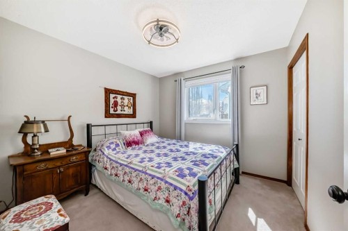 39 Westfall Crescent, Okotoks, AB - Indoor Photo Showing Bedroom
