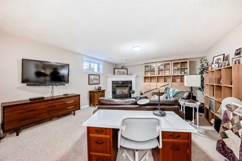 39 Westfall Crescent, Okotoks, AB - Indoor With Fireplace