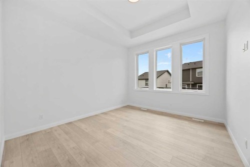 101 Creekstone Hill Sw, Calgary, AB - Indoor Photo Showing Other Room