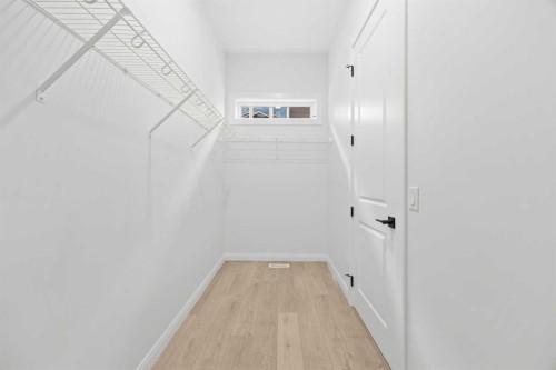 101 Creekstone Hill Sw, Calgary, AB - Indoor Photo Showing Other Room