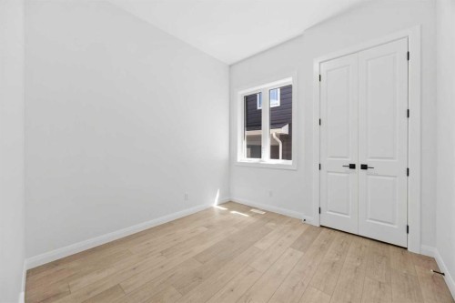 101 Creekstone Hill Sw, Calgary, AB - Indoor Photo Showing Other Room