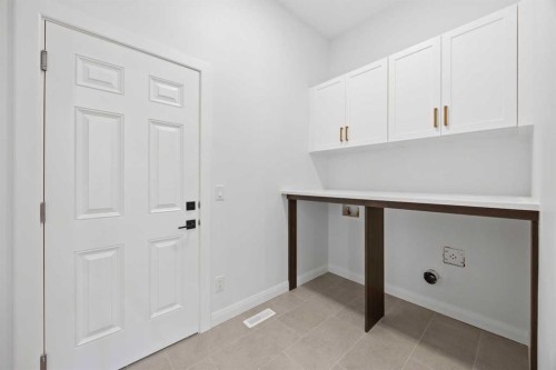 101 Creekstone Hill Sw, Calgary, AB - Indoor Photo Showing Other Room